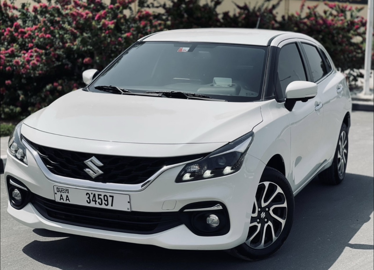 White Suzuki Baleno Hatchback - Compact & Modern